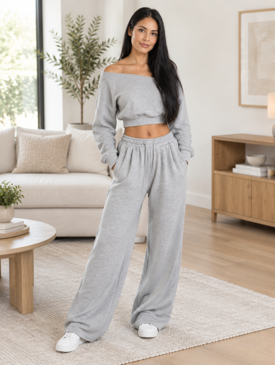Grey off-shoulder two-piece set styled in a living room